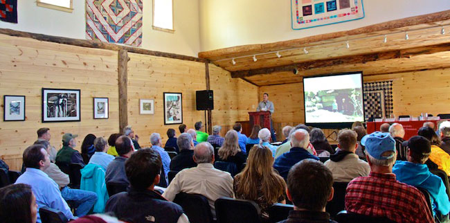 Attendees watch a presentation at the Ashokan Watershed Conference.